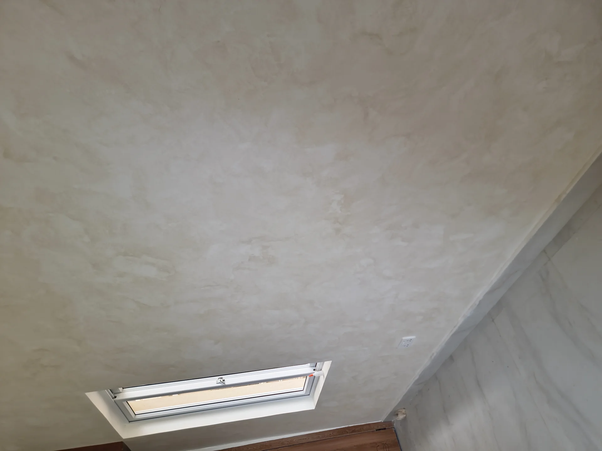 Decorative limewash wall finish applied by OFPAD